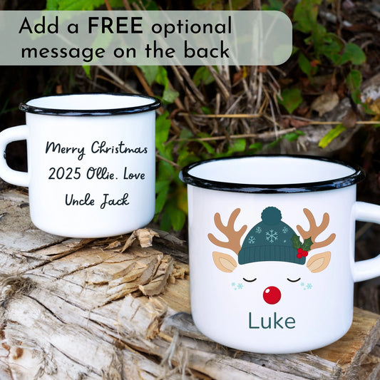 kids christmas mug: Personalised Christmas mug: Two white personalised christmas mugs with silver rims; one has a Christmas message and the other has a reindeer design with 'Luke' text for kids.