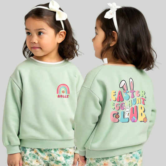 Girls personalised Easter sweatshirt with rainbow name design on front and Easter Egg Hunt Club bunny print on back