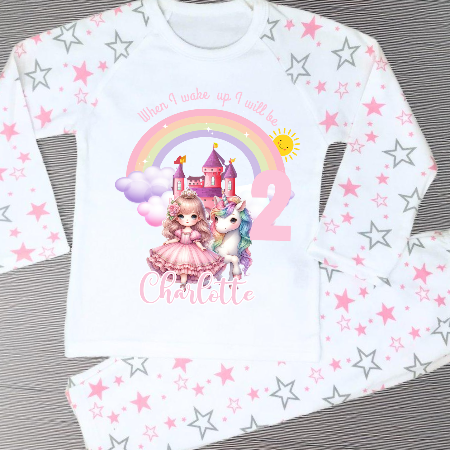 Princess Birthday Pyjamas: A pink and white long-sleeved pyjama set with a rainbow, castle, unicorn, and a princess in a pink dress. The top has the text 'When I wake up I will be with age and name. It will be a perfect personalised gift for a girls birthday to compliment a princess unicorn birthday party.