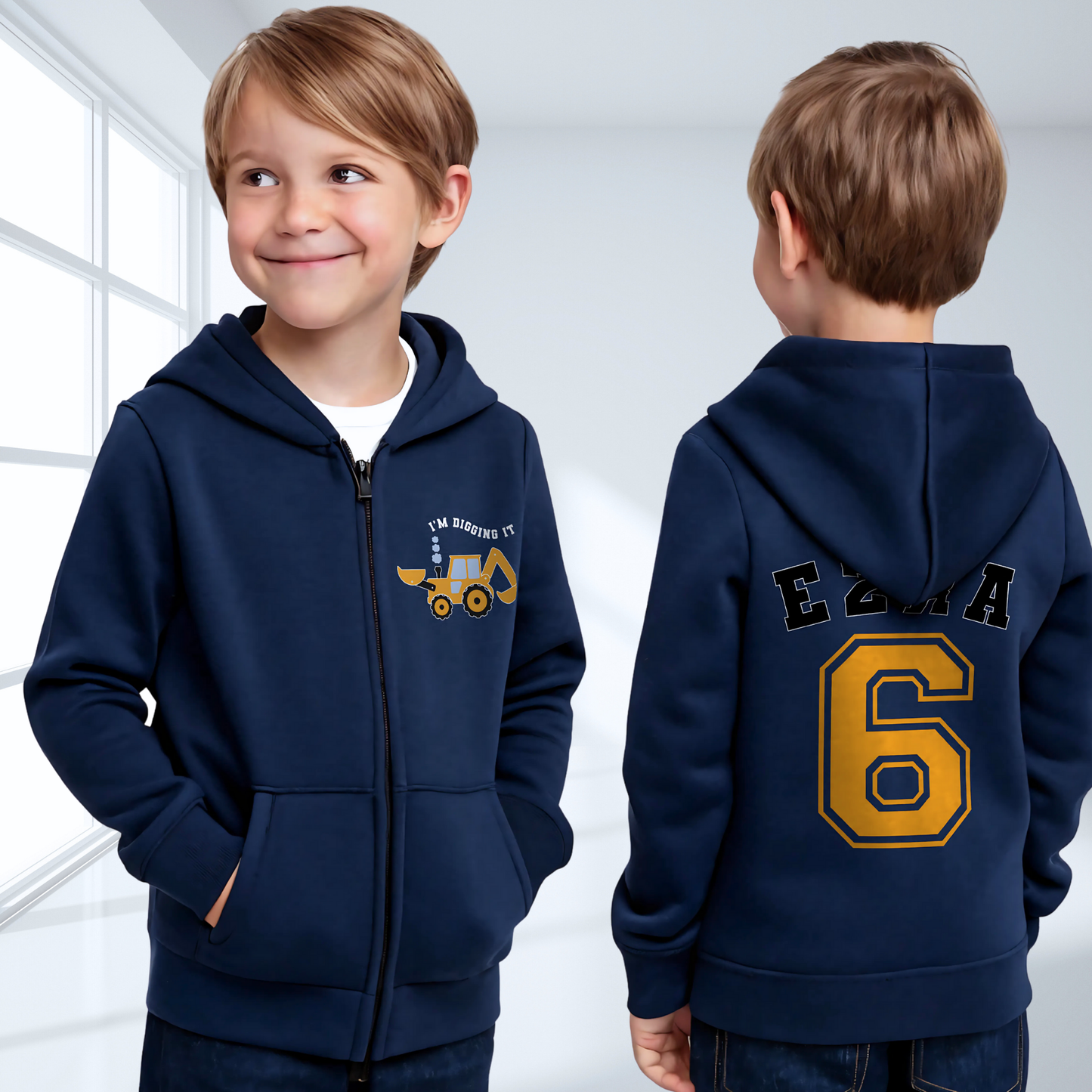 Boys Digger Hoodie: kids personalised zip-up hoodie featuring a playful construction theme. The back of the hoodie showcases the childs name and number in a varsity font. On the front is a vibrant print of a digger or tractor with the words I am Digging it, adding a fun touch for young construction enthusiasts. Great for toddler birthday gifts, graphic hoodie for boys, birthday gift, Name and Number Hoodie for Kids.