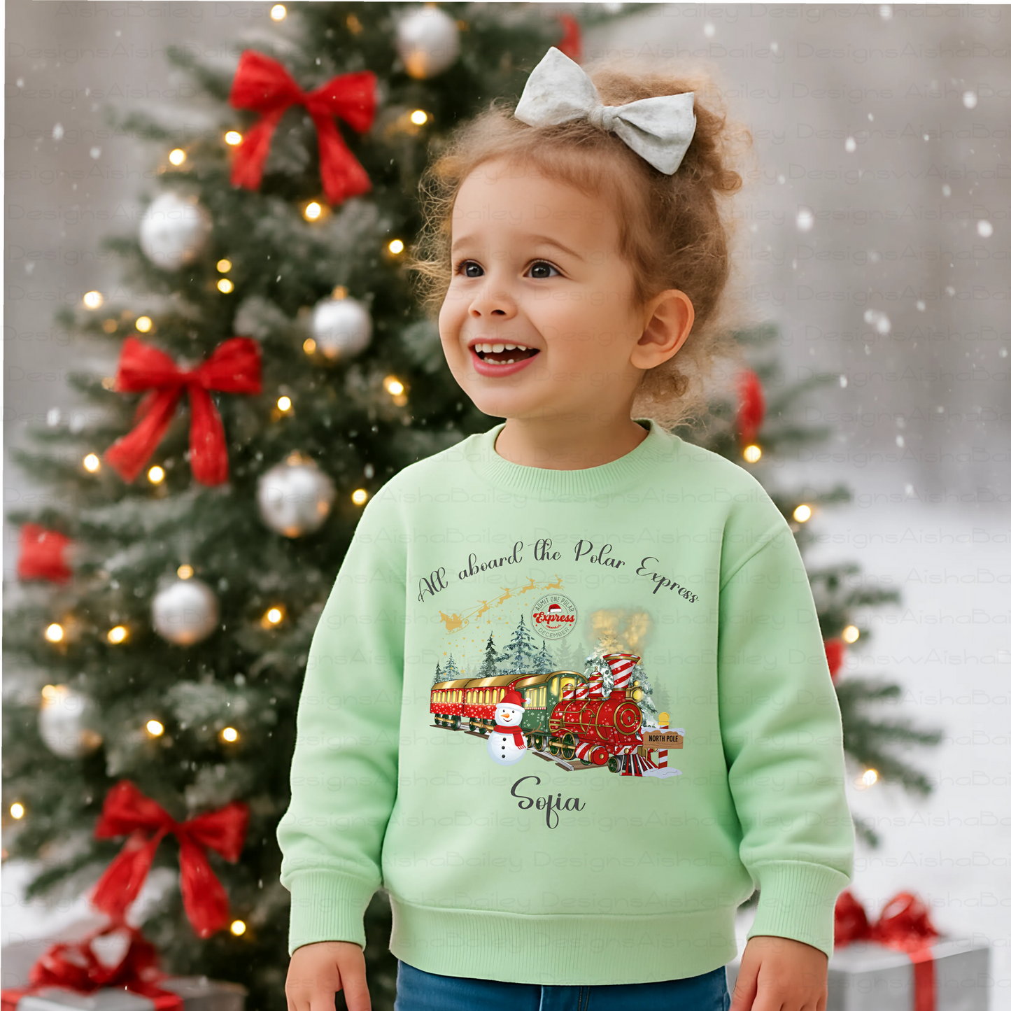 personalised christmas sweatshirt for girls featuring polar express festive design, soft cosy jumper customised with name, perfect Christmas gift outfit, Christmas jumper day