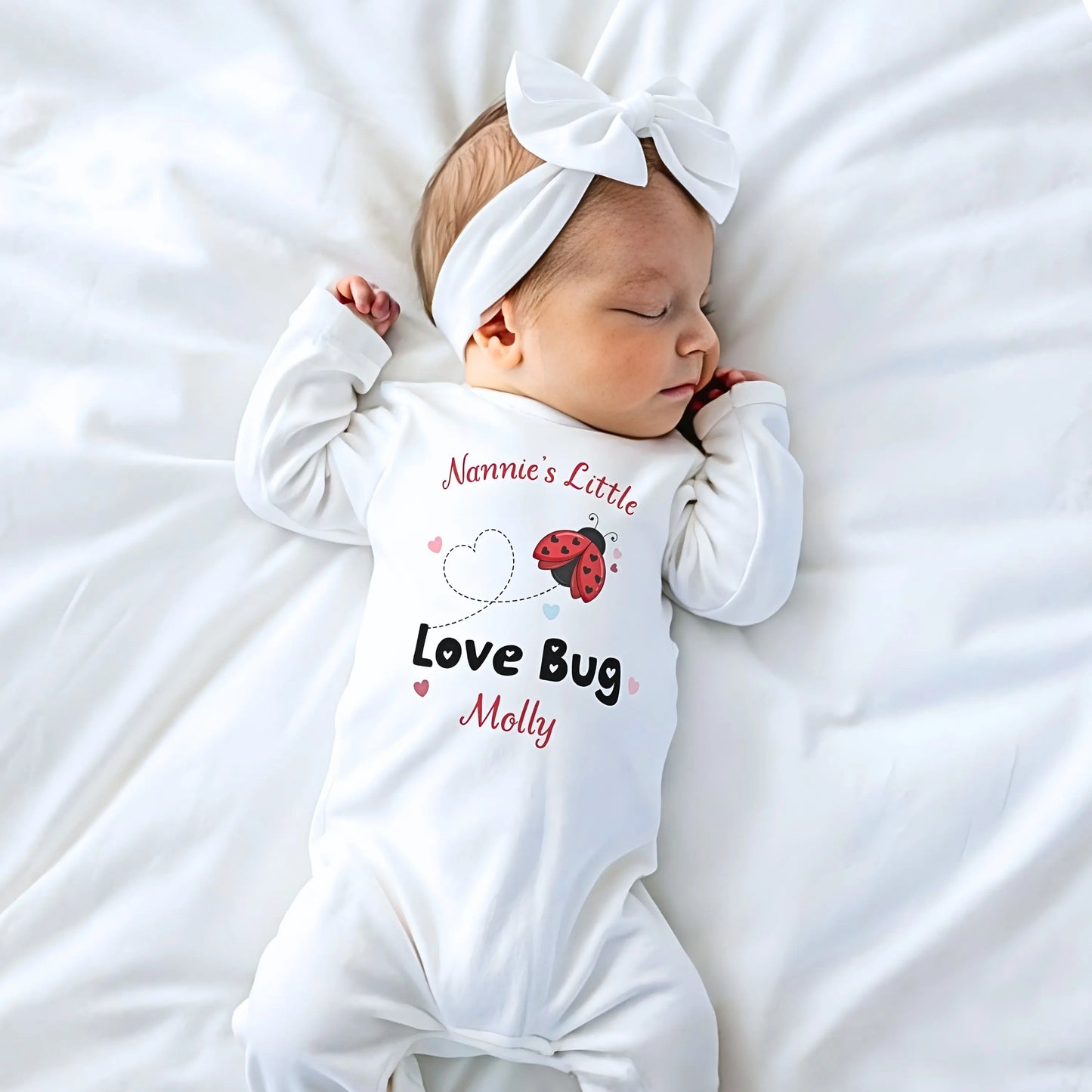 Valentine Baby Outfit personalised for Valentines day. Baby grow, vest and bib with a love bug (ladybird) design