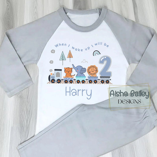 Personalised Safari birthday pyjamas with animal train design, custom name and age for boys