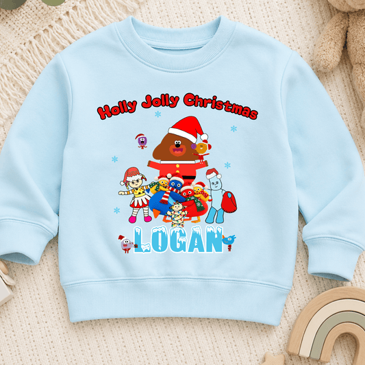 Personalised CBeebies Christmas Jumper for kids featuring festive CBeebies-inspired characters and a custom name, perfect for Christmas.