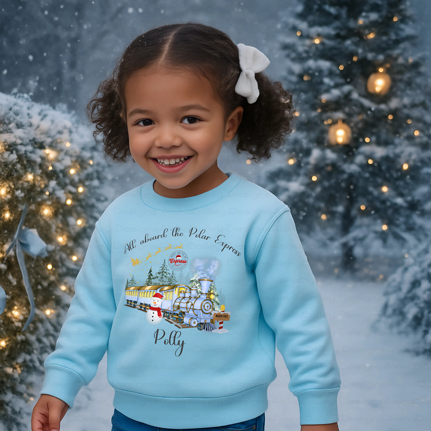 personalised christmas sweatshirt for girls featuring polar express festive design, soft cosy jumper customised with name, perfect Christmas gift outfit, Christmas jumper day