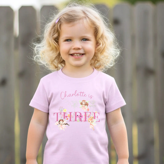 Personalised Fairy Birthday T-shirt, Personalised fairy birthday outfit for girls featuring custom name, chosen age, fairy garden artwork and floral design, perfect for birthday celebrations and photoshoots.