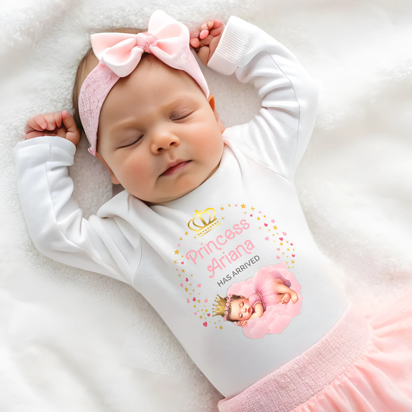 Personalised baby outfit: A collection of vibrant and charming baby clothes, featuring sleepsuits, bodysuits, T-shirts, and bibs, all designed for baby girls. The items are part of the “Personalised Baby Girls The Princess Has Arrived” collection.. The collection allows for customisation with a baby’s name, making these pieces ideal for gifts or special occasions. This will make a great newborn baby gift for gender reveal, baby shower, or to welcome a new baby coming home outfit.