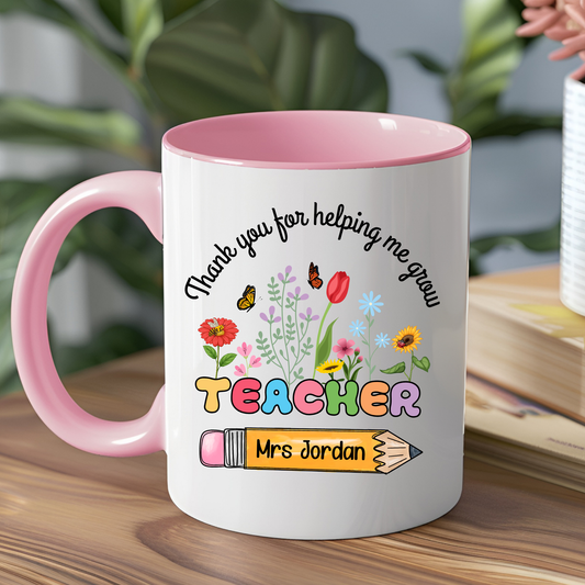 Personlised teacher mug, A thank you teacher mug that is personalised. At the top it says thank you for helping me grow in curved writing. Under it is teacher in vibrant rainbow colours with spring flowers growing from it. Under it is a pencil with the teacher's name. It's great as an end of school gift for teachers, teacher apreciationalised Teacher Mug. Thank You Mug, Custom Gift For Teacher, Thank You For Helping Me Grow Teacher Flower Mug, End of School Teacher Gift