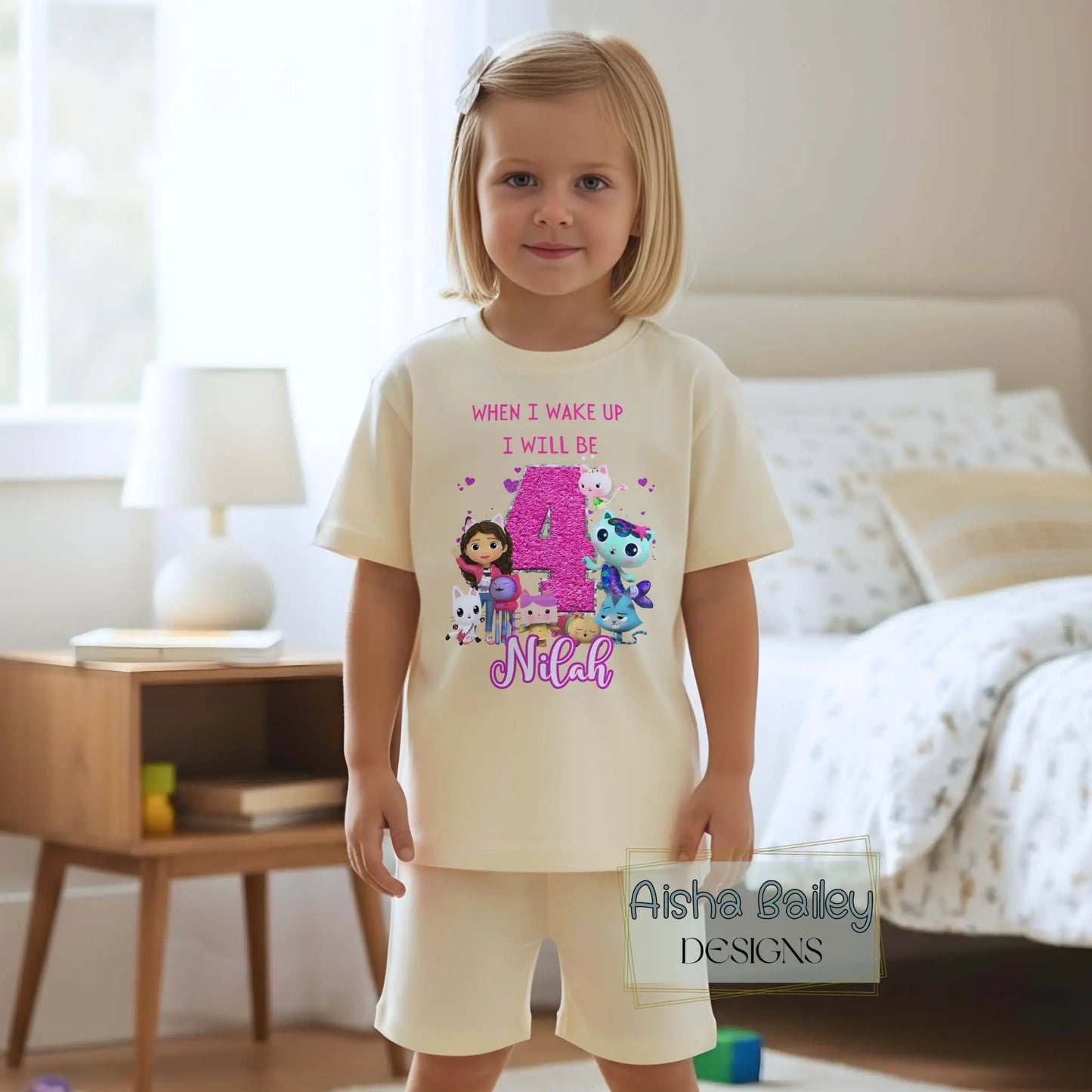 Personalised Gabby's Dollhouse birthday pyjamas for girls. Add name & age for a cute, comfy birthday sleepwear set. Perfect gift idea.
