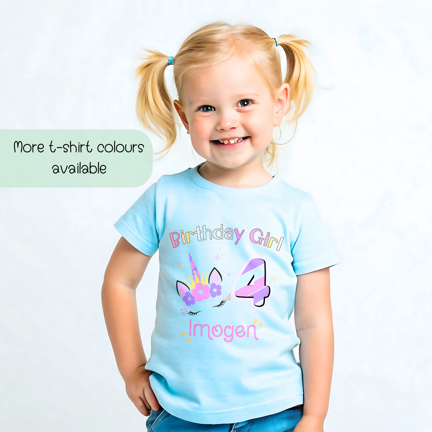 Unicorn Birthday T-shirt for girls, A personalised birthday t-shirt for girls, featuring a pink and purple unicorn design. The t-shirt is customisable with the child's name and age, making it a perfect birthday gift. The vibrant colours and whimsical unicorn imagery make it an ideal choice for a toddler celebrating her special day. The t-shirt is available in white, blue and pink.