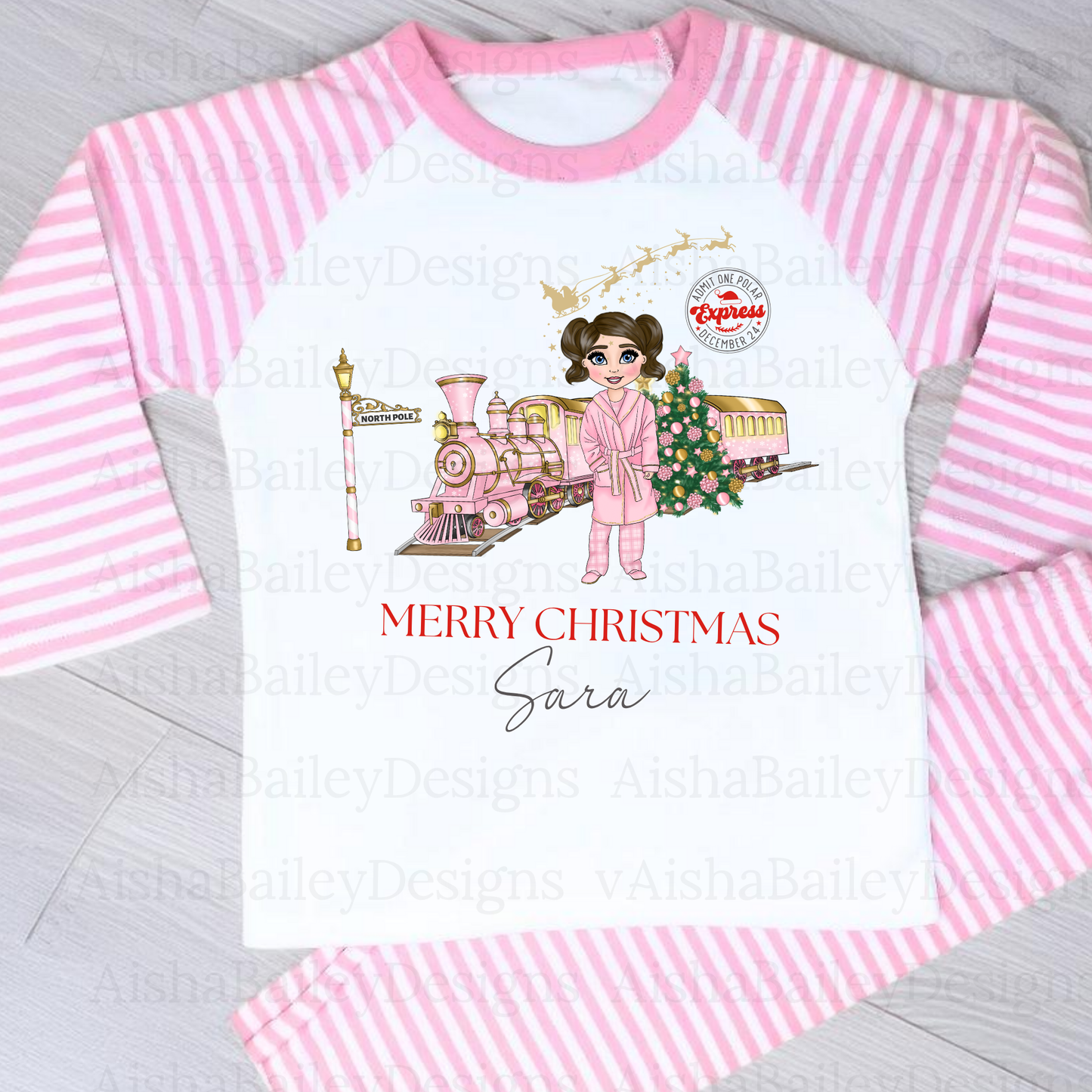 Polar Express Christmas Pyjamas: A set of Polar Express Christmas pyjamas for children, featuring a festive design with a Christmas train and the message "Merry Christmas." The pyjamas are customizable, allowing for personalization of the doll's hair color, skin tone, and eye color to reflect the child's unique features, creating a special, memorable keepsake.