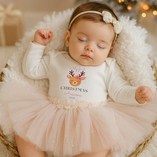Personalised First Christmas Outfit for baby girl with cute reindeer and pink bow, custom name and first Christmas year, available in a choice of items.