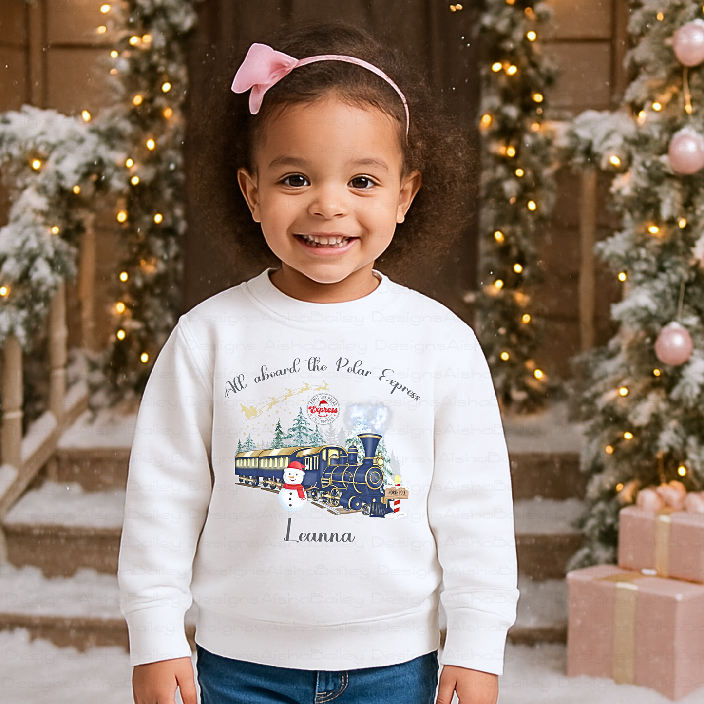 personalised christmas sweatshirt for girls featuring polar express festive design, soft cosy jumper customised with name, perfect Christmas gift outfit, Christmas jumper day
