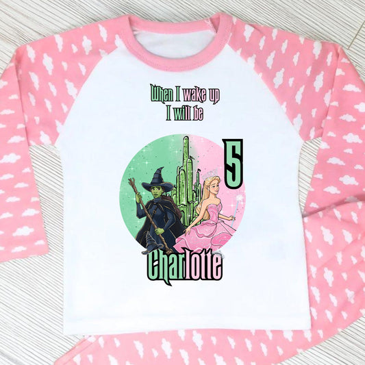 Pink Wicked Birthday Pyjamas for Girls with custom name and age featuring magical character design.