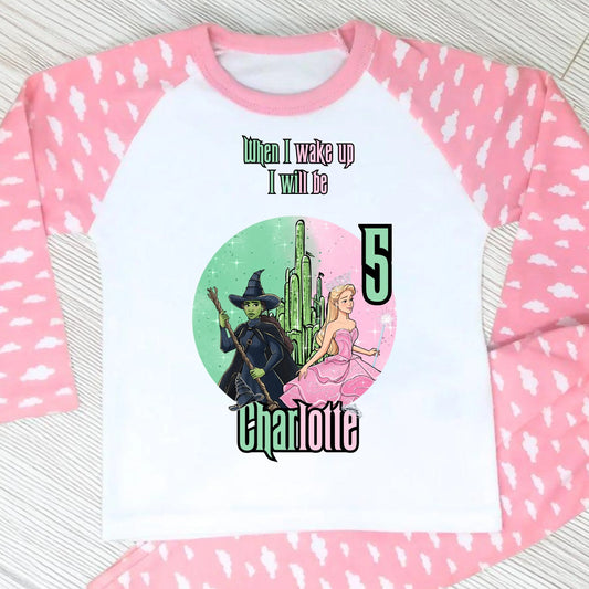 Pink Wicked Birthday Pyjamas for Girls with custom name and age featuring magical character design.