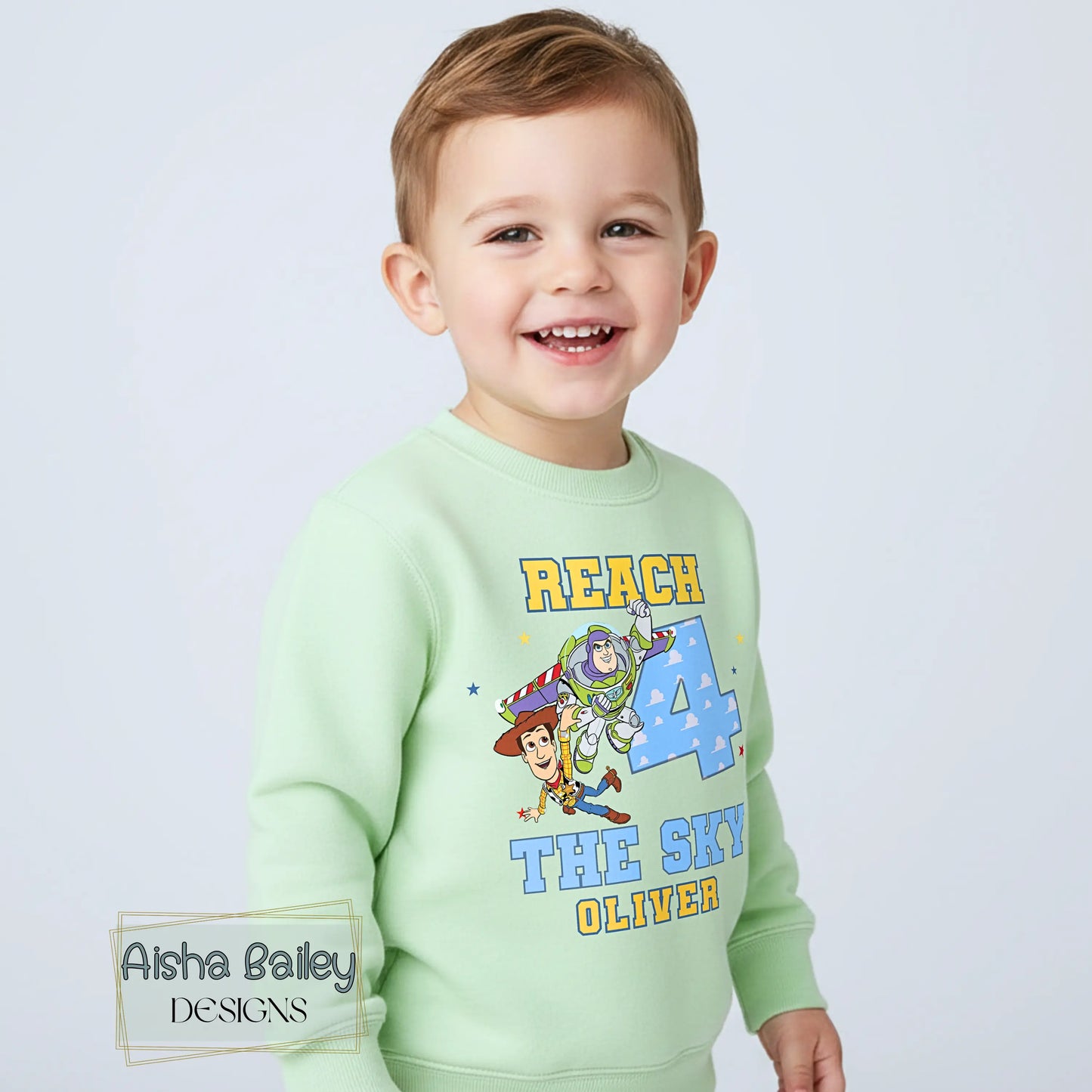 Personalised Toy Story birthday sweatshirt for boys 4th birthday with custom name reach 4 the sky design cosy jumper
