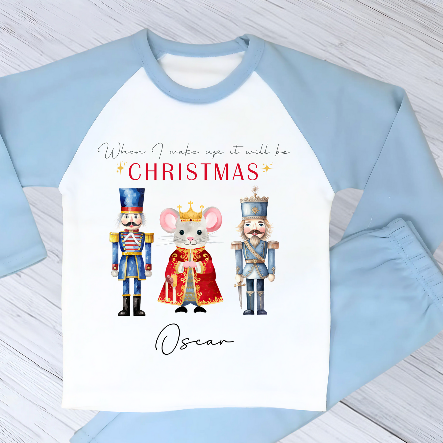 Nutcracker christmas pyjamas, A set of personalised boys Nutcracker-themed Christmas pyjamas, featuring the festive phrase “When I Wake Up It Will Be Christmas.” These cosy christmas pyjamas are adorned with whimsical Nutcracker illustrations, perfect for adding a touch of magic to a child's Christmas Eve: personalized, boys, Nutcracker, Christmas pyjamas, festive, holiday, cosy, magical.
