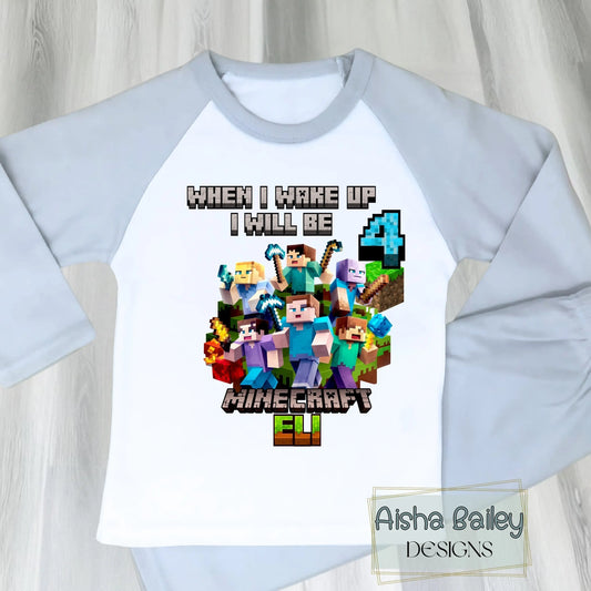 Personalised boys Minecraft birthday pyjamas with child’s name and age, featuring vibrant game-inspired design on a soft cotton pyjama set.