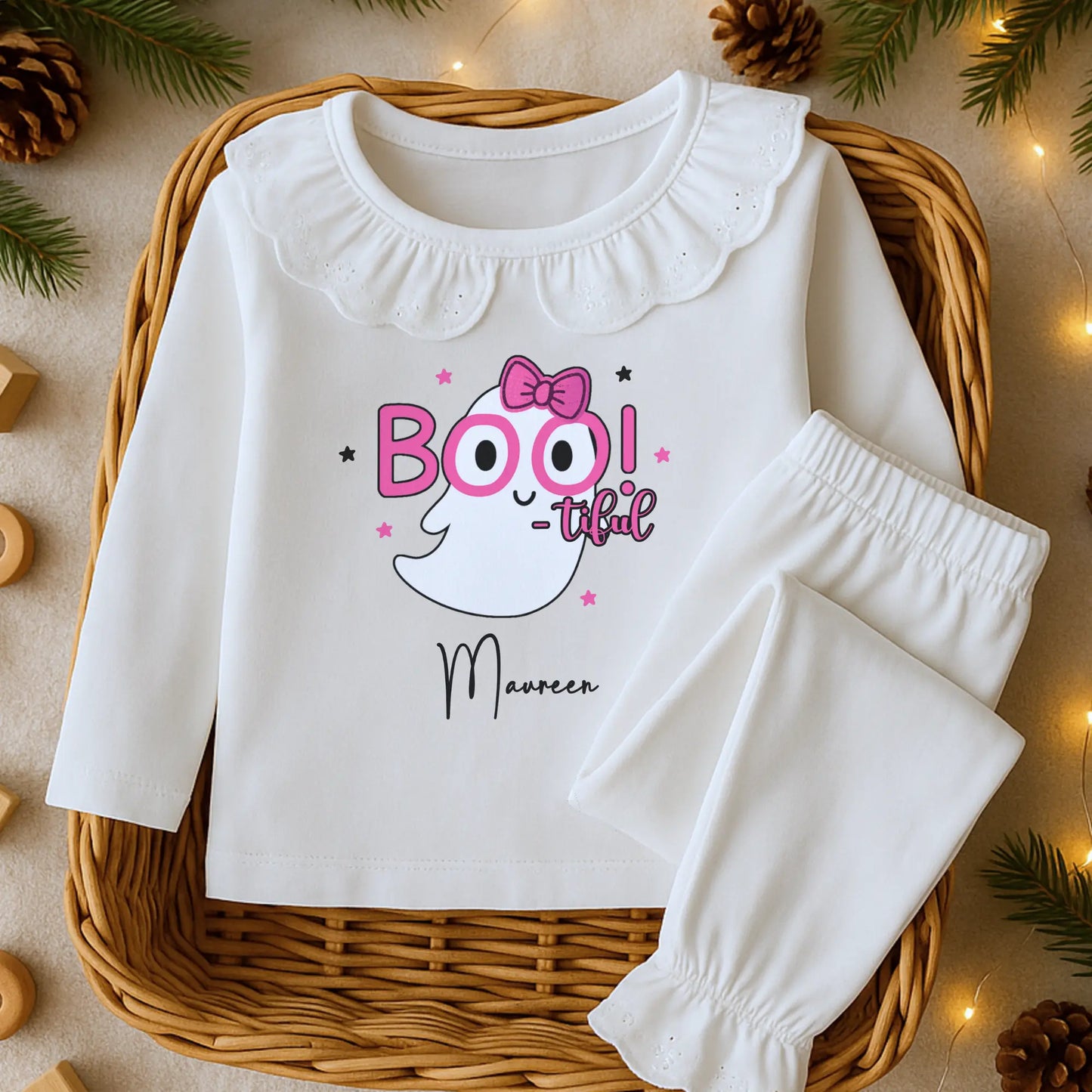 Personalised Halloween pyjamas for girls with “Boo-tiful” ghost design on white frill set.