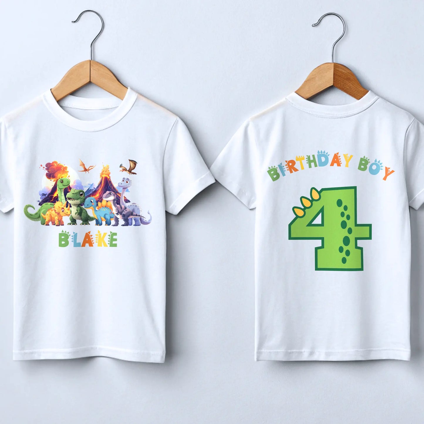 Dinosaur Birthday T-shirt: Personalised Boys Dinosaur Birthday T-Shirt, designed for a toddler's birthday party. The shirt features a vibrant back print of a playful dinosaur number, symbolising the birthday boy age. It's a stylish, comfortable, and customisable Dino Trex Party Top, perfect for a dinosaur-themed celebration. Personalisation options include adding the child's name and age, making it a unique keepsake. Ideal for making your little dino-lover feel special on his birthday.