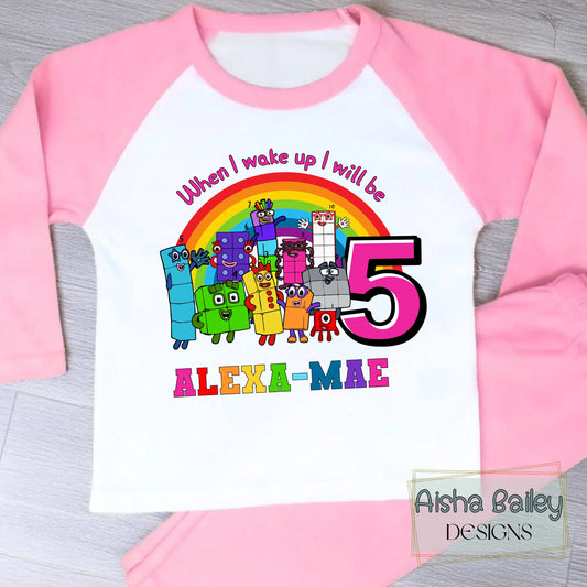 Numberblocks birthday pyjamas for girls personalised with name and age
Personalised girls birthday eve pyjamas featuring Numberblocks characters
Milestone birthday pyjama set with custom name and age