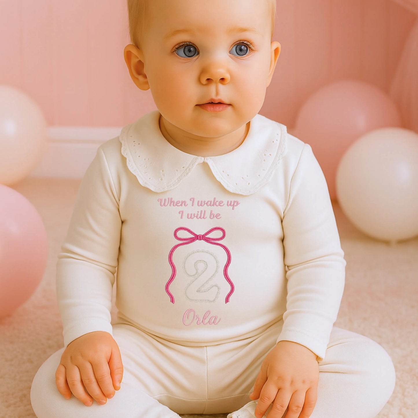 Bow birthday pyjamas for girls with embroidered bow and gold lace stitch birthday number