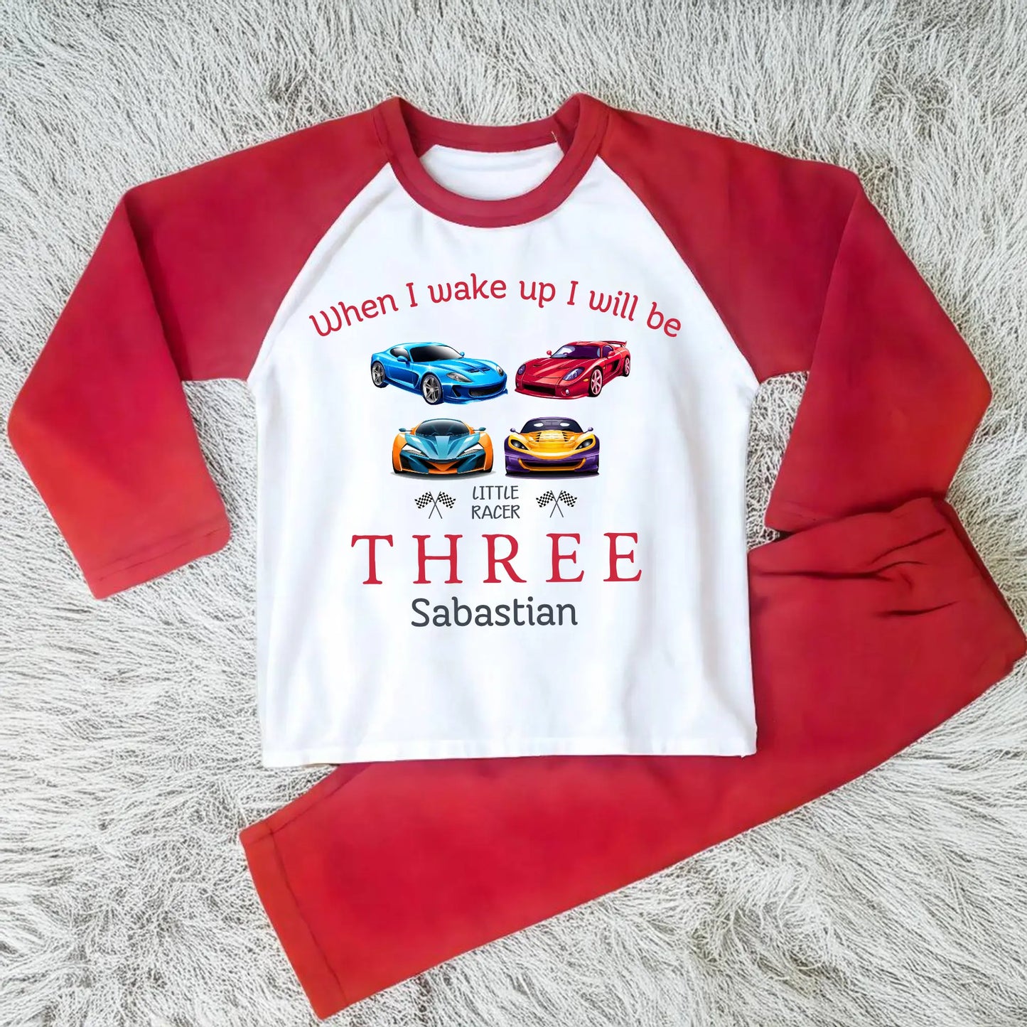 little racer birthday pyjamas - Personalised Boys Racing Car Birthday PJs. A vibrant cotton two piece set designed for little racers, featuring a playful sports car print. Perfect for birthday parties or everyday wear, this shirt is customised to make your child feel like a racing champion. On the top it has the writing when i wake up i will be with their number of age. It has four sports car and their name under the design. Great for birthday boys that love sports cars.
