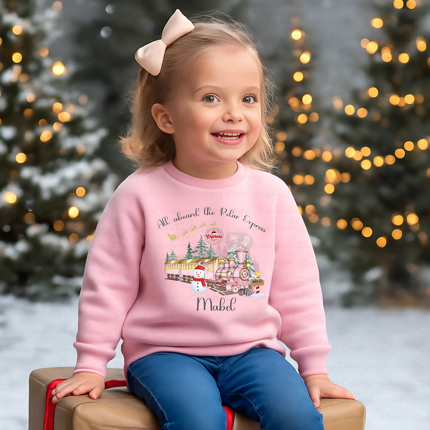 personalised christmas sweatshirt for girls featuring polar express festive design, soft cosy jumper customised with name, perfect Christmas gift outfit, Christmas jumper day