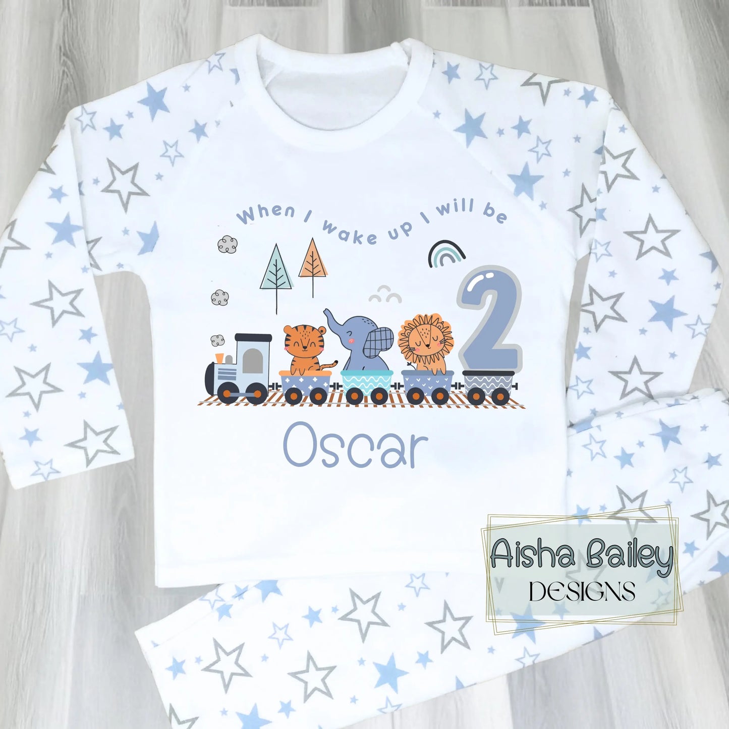Personalised Safari birthday pyjamas with animal train design, custom name and age for boys