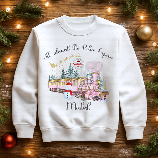 personalised christmas sweatshirt for girls featuring polar express festive design, soft cosy jumper customised with name, perfect Christmas gift outfit, Christmas jumper day