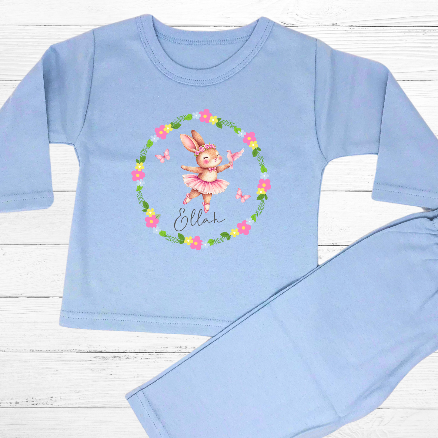Personalised baby pyjamas: A set of personalised baby girl clothes featuring a dusky pink ballet bunny surrounded by a floral wreath. The pyjamas are designed for ages 0-2 years and includes flower-themed pyjamas. It can be customised with a name, making it a thoughtful new baby gift: Personalised Baby Girls Dusky Pink Ballet Bunny Floral Wreath 0-2 Years, New Baby Gift with Name, Flower Pyjamas, Custom Baby Girl Clothes