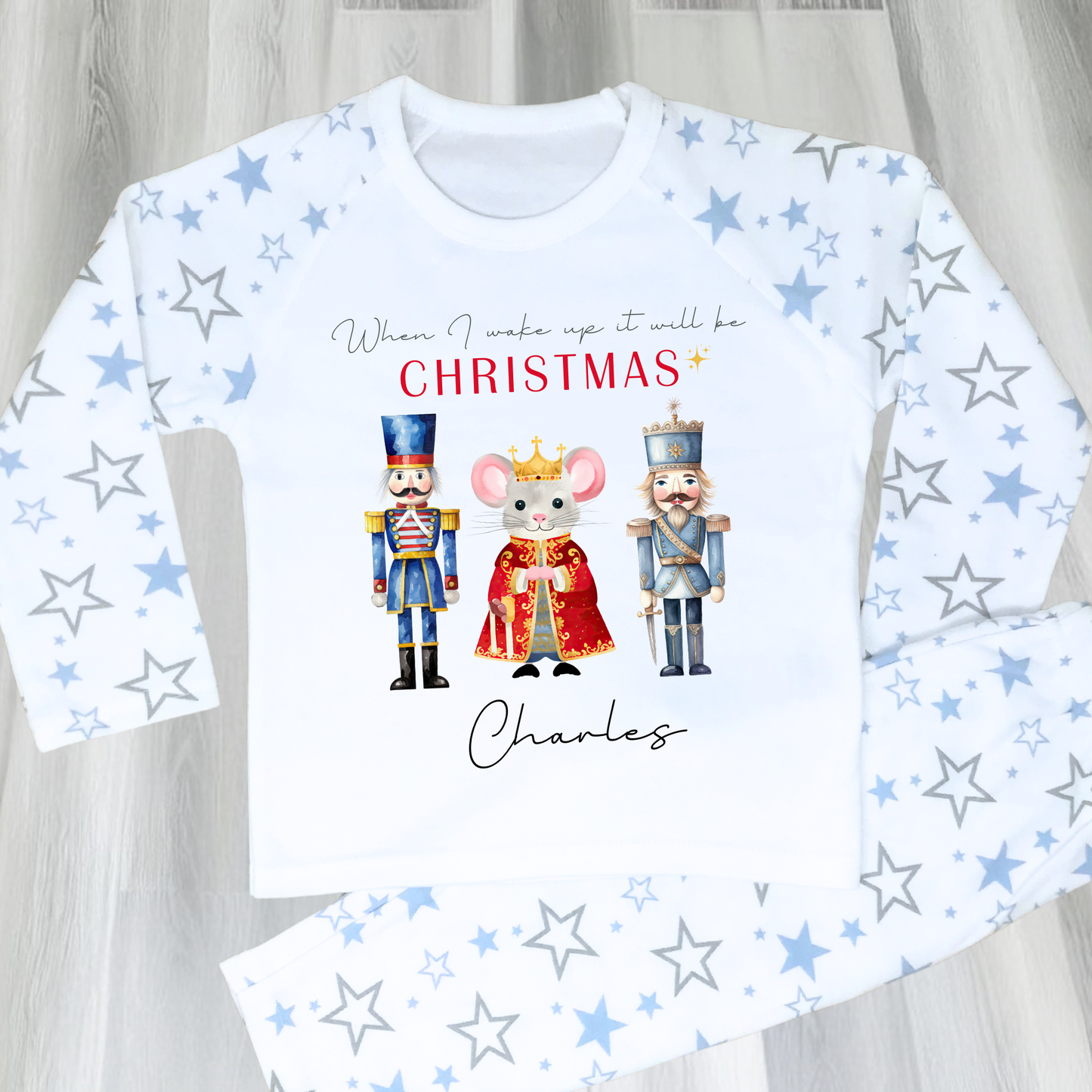 Nutcracker christmas pyjamas, A set of personalised boys Nutcracker-themed Christmas pyjamas, featuring the festive phrase “When I Wake Up It Will Be Christmas.” These cosy christmas pyjamas are adorned with whimsical Nutcracker illustrations, perfect for adding a touch of magic to a child's Christmas Eve: personalized, boys, Nutcracker, Christmas pyjamas, festive, holiday, cosy, magical.