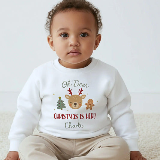 Kids Christmas Sweatshirt for boys, personalised with his name and featuring a cute reindeer, Christmas tree and gingerbread festive design.