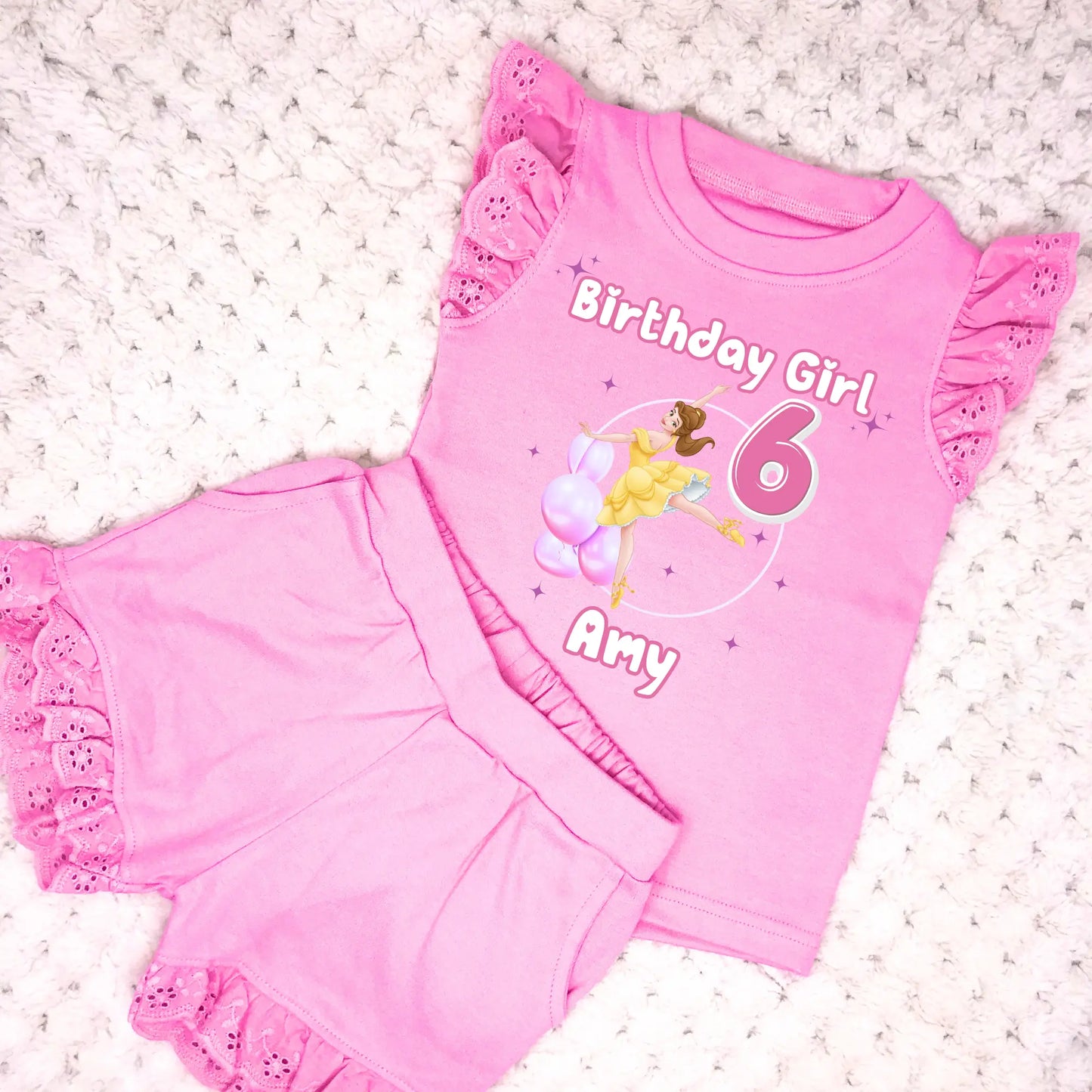 Personalised Girls Princess Ballerina Birthday Outfit, Ballerina Birthday Frilly Shorts & Top in Pink. At the top it says Birthday Girl, followed by a princess ballerina in a balloon arch and the child's name underneath.