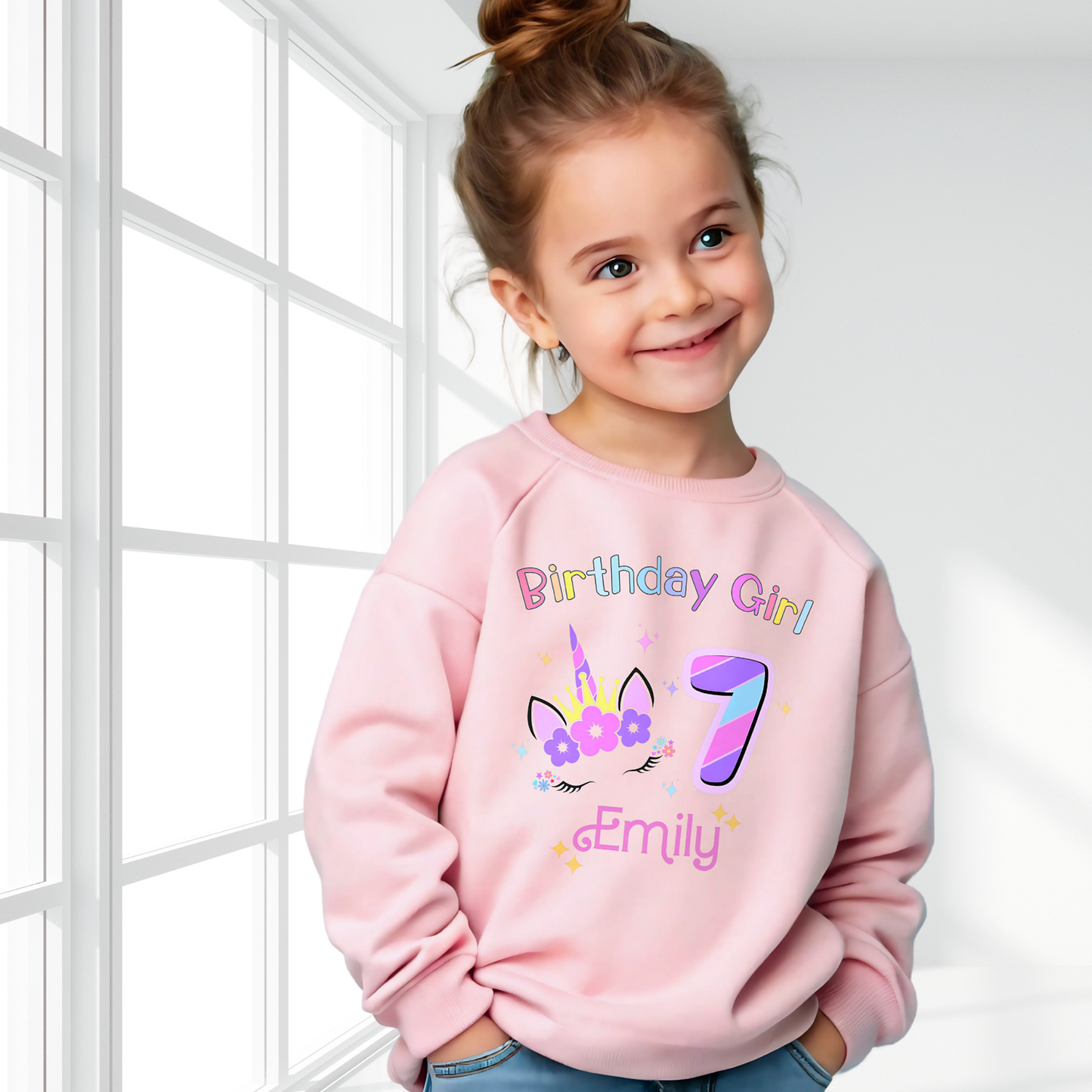 Unicorn Birthday Sweatshirt, A personalised birthday jumper for girls, featuring a pink and purple unicorn design. The sweatshirt is customisable with the child's name and age, making it a perfect birthday gift. The vibrant colours and whimsical unicorn imagery make it an ideal choice for a toddler celebrating her special day.