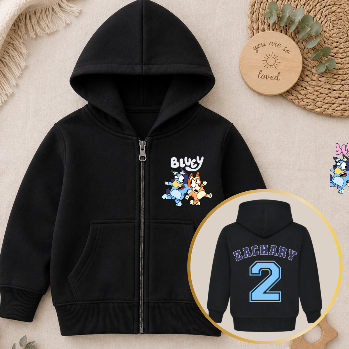 Personalised Boys Birthday Hoodie featuring Bluey and Bingo on the front, with your child's name and birthday age in a fun varsity-style design on the back.