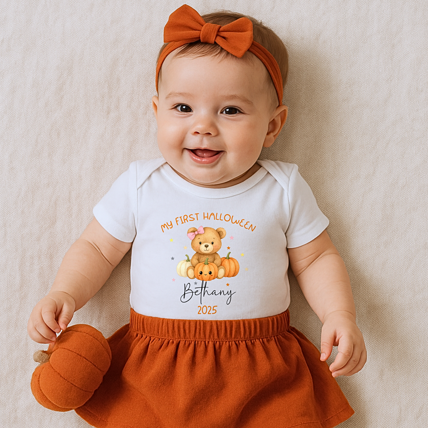 Personalised First Halloween Outfit for baby girl with teddy and pumpkin design, customised with baby name.