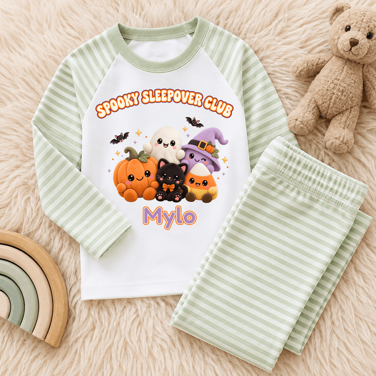 Personalised Halloween Pyjamas for Kids with kawaii plush pumpkin, ghost, witch, black cat and candy corn Spooky Sleepover Club design.