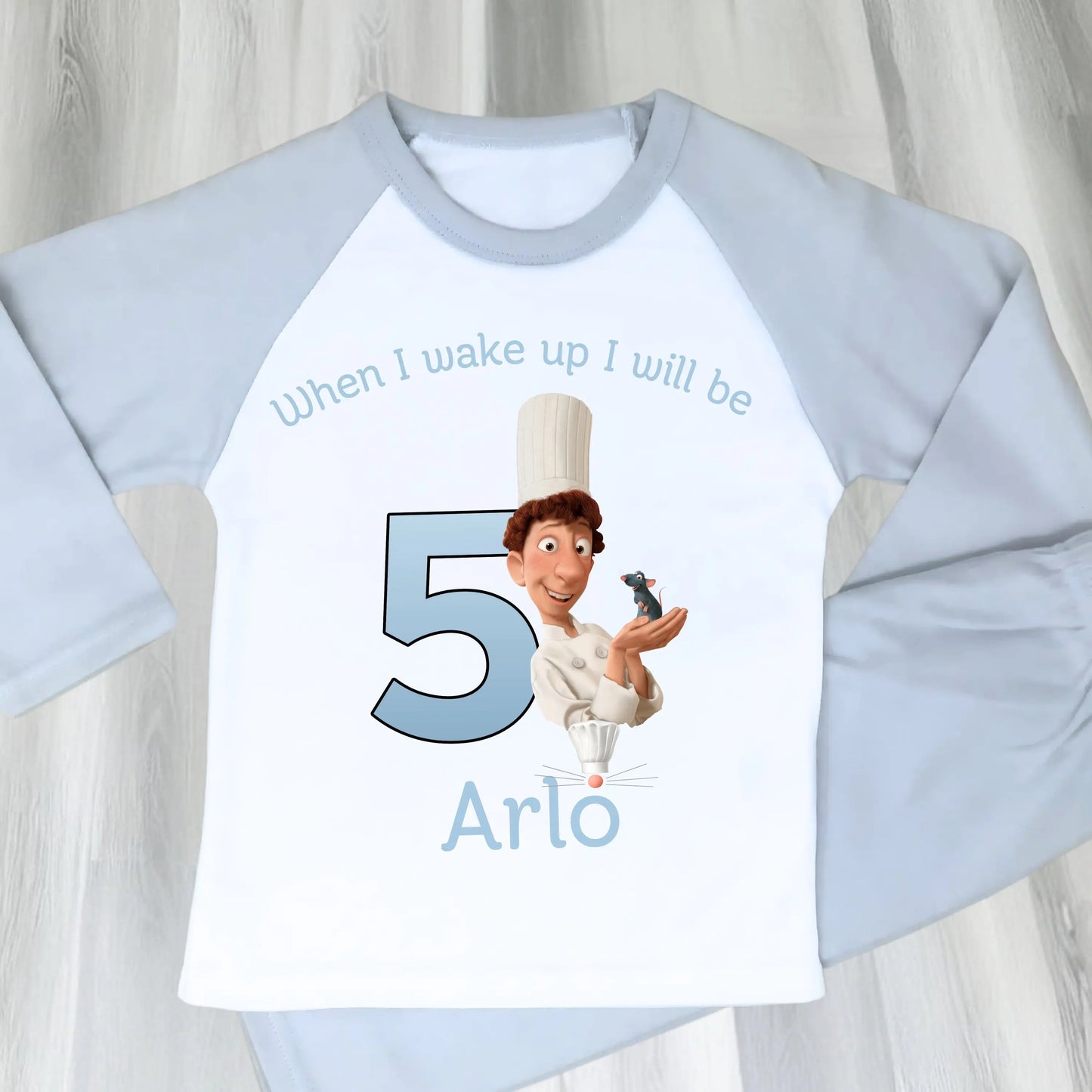 Ratatouille birthday pyjamas: Blue and white personalised birthday pyjamas with ratatouille character with name and age for boys