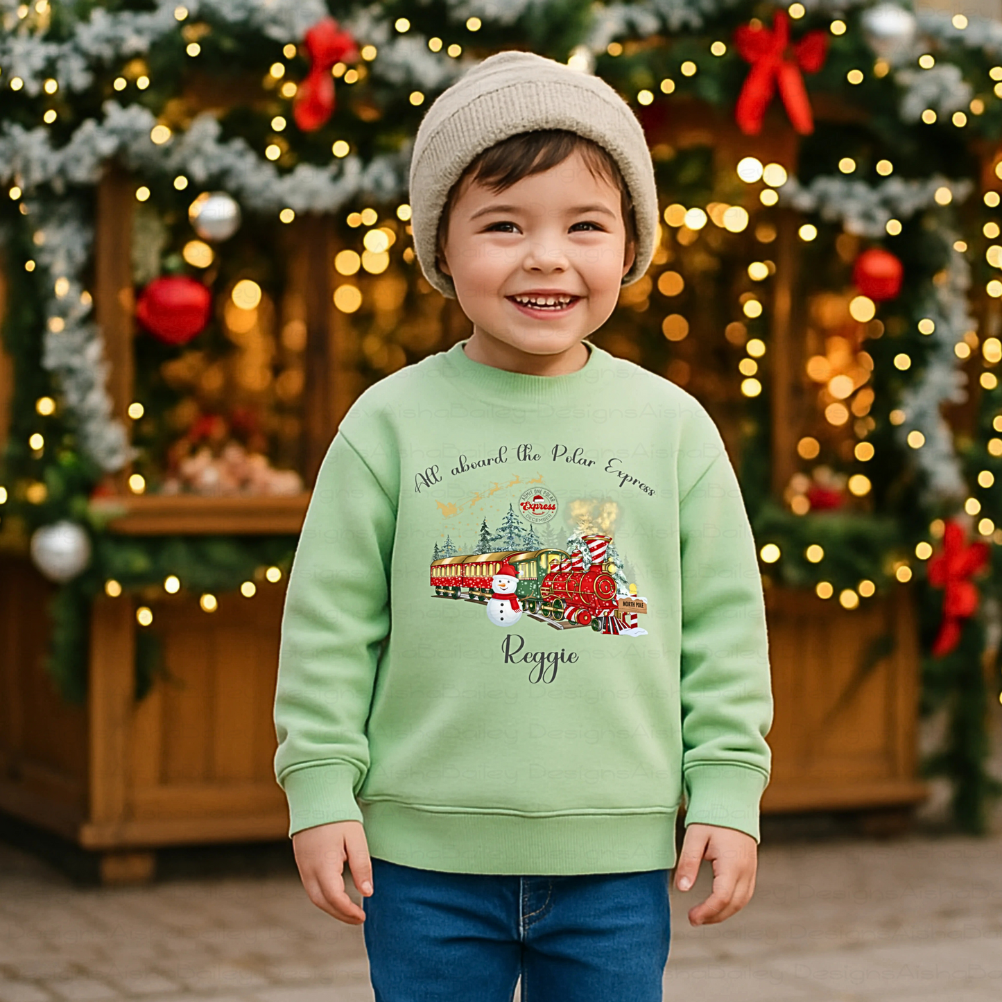 personalised christmas sweatshirt for boys featuring polar express festive design, soft cosy jumper customised with name, perfect Christmas gift outfit, Christmas jumper day