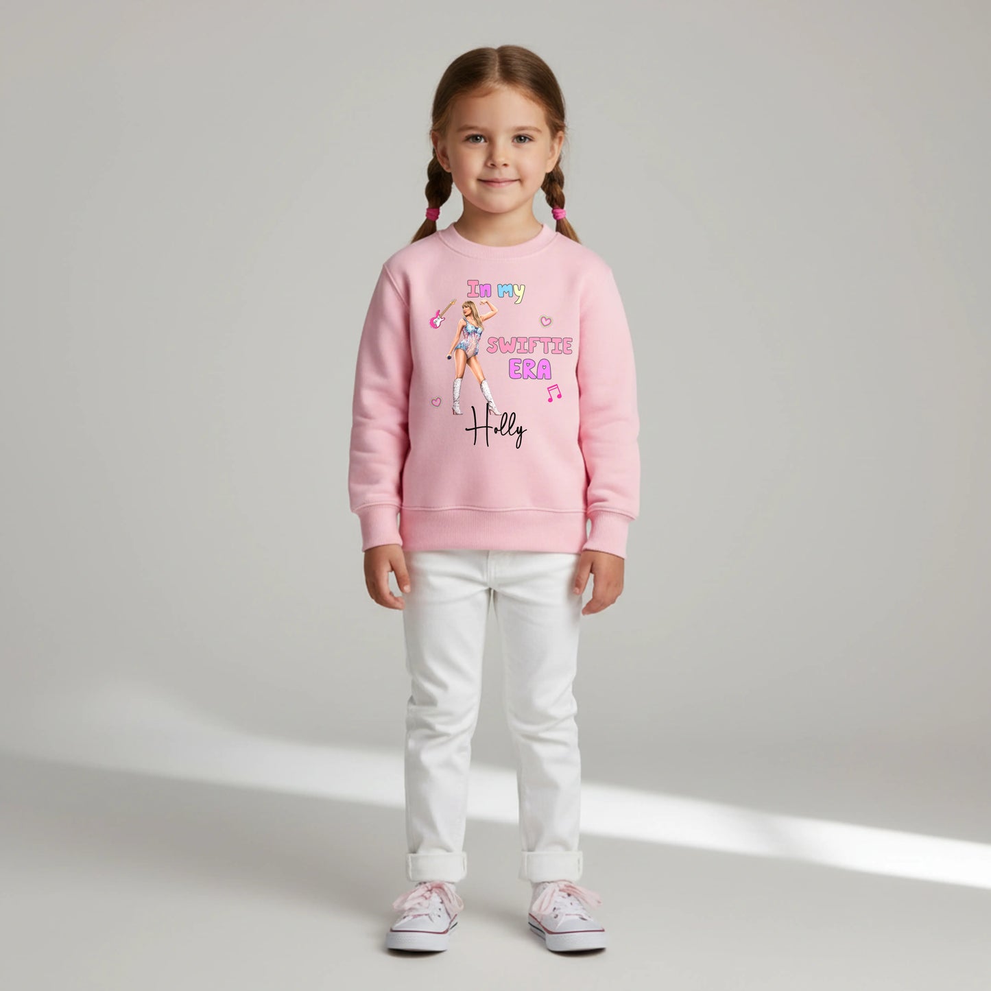Taylor Swift sweatshirt personalised with her custom name for everyday wear. The perfect girls gift for the little Swifie