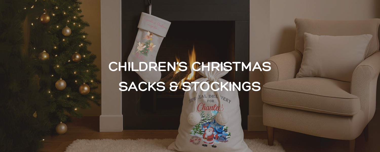 A personalised Christmas stocking and Sack near a Christmas Tree and fireplace with children's Christmas gifts in them