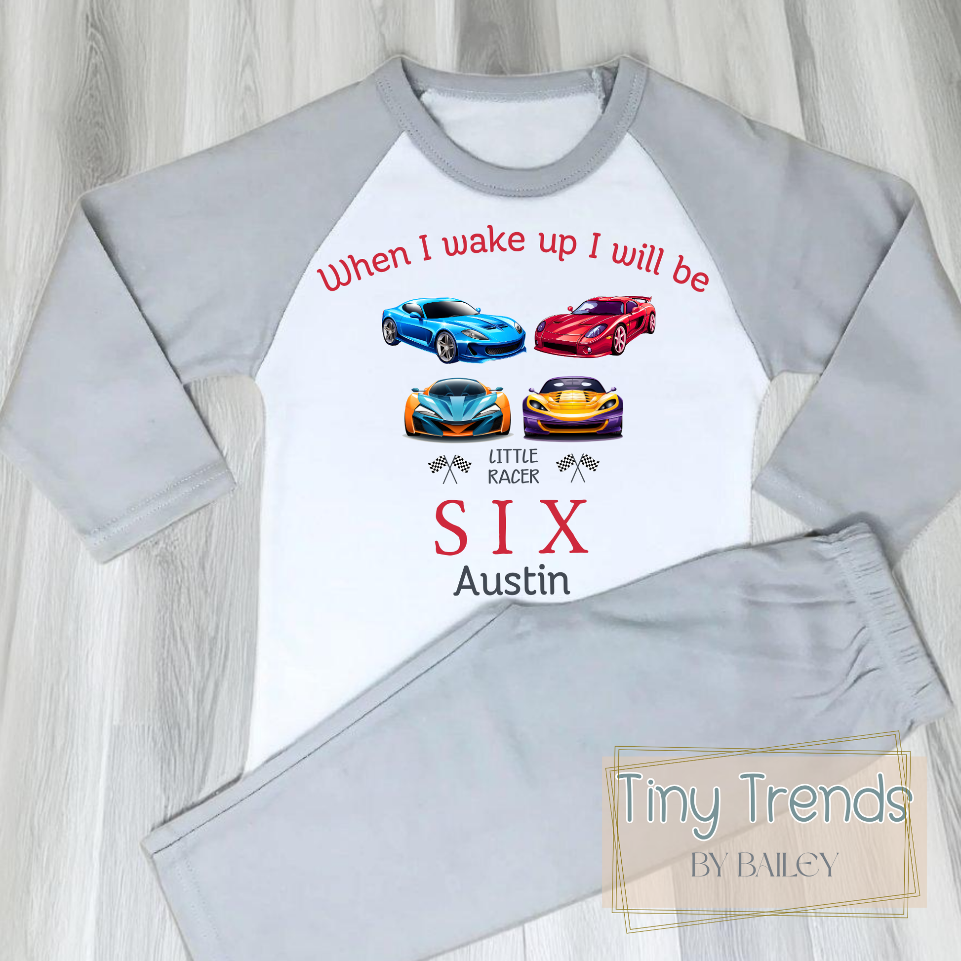 little racer birthday pyjamas - Personalised Boys Racing Car Birthday PJs. A vibrant cotton two piece set designed for little racers, featuring a playful sports car print. Perfect for birthday parties or everyday wear, this shirt is customised to make your child feel like a racing champion. On the top it has the writing when i wake up i will be with their number of age. It has four sports car and their name under the design. Great for birthday boys that love sports cars.