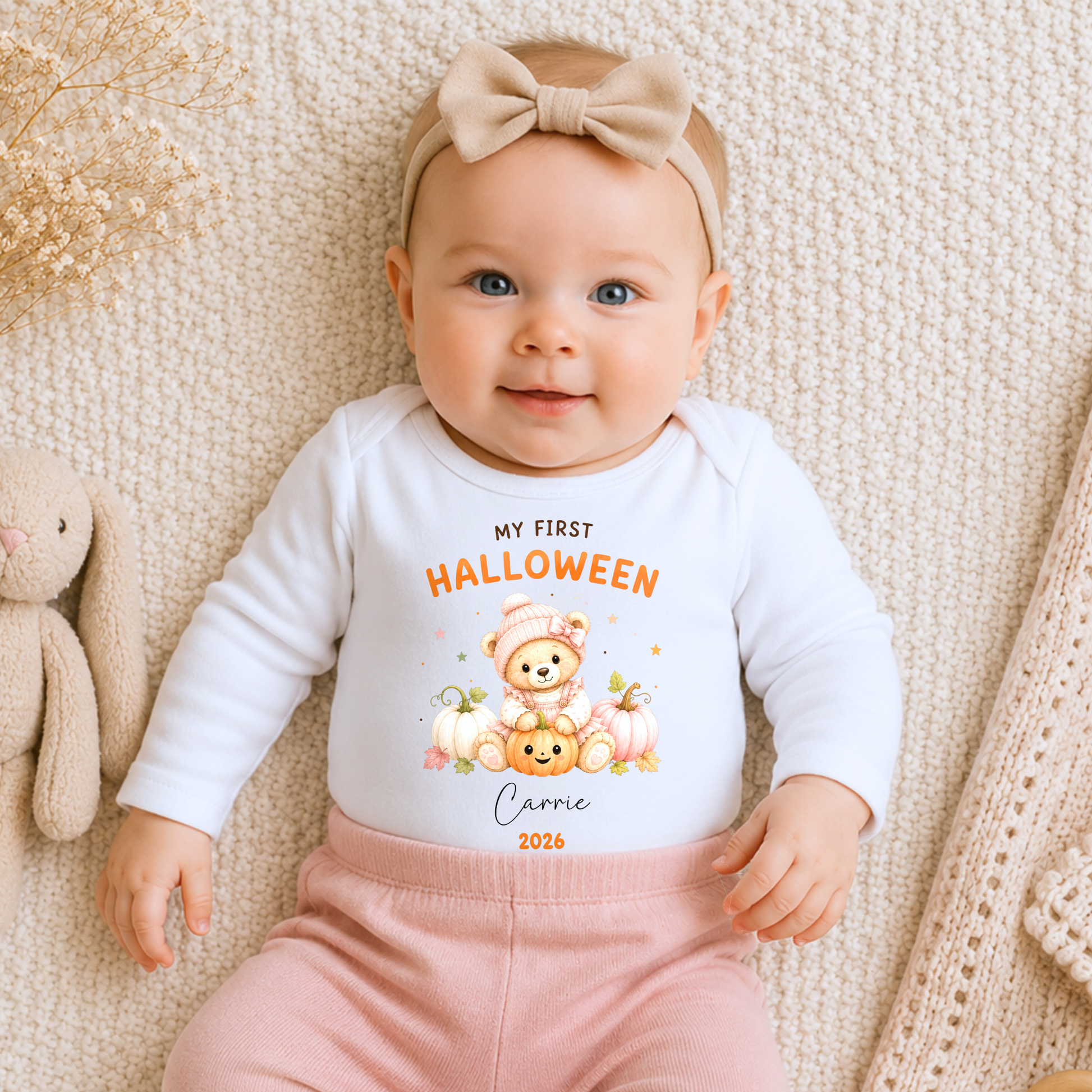 Personalised First Halloween Baby Outfit with cute teddy bear and pumpkins, customised with baby's name and year for their first Halloween.