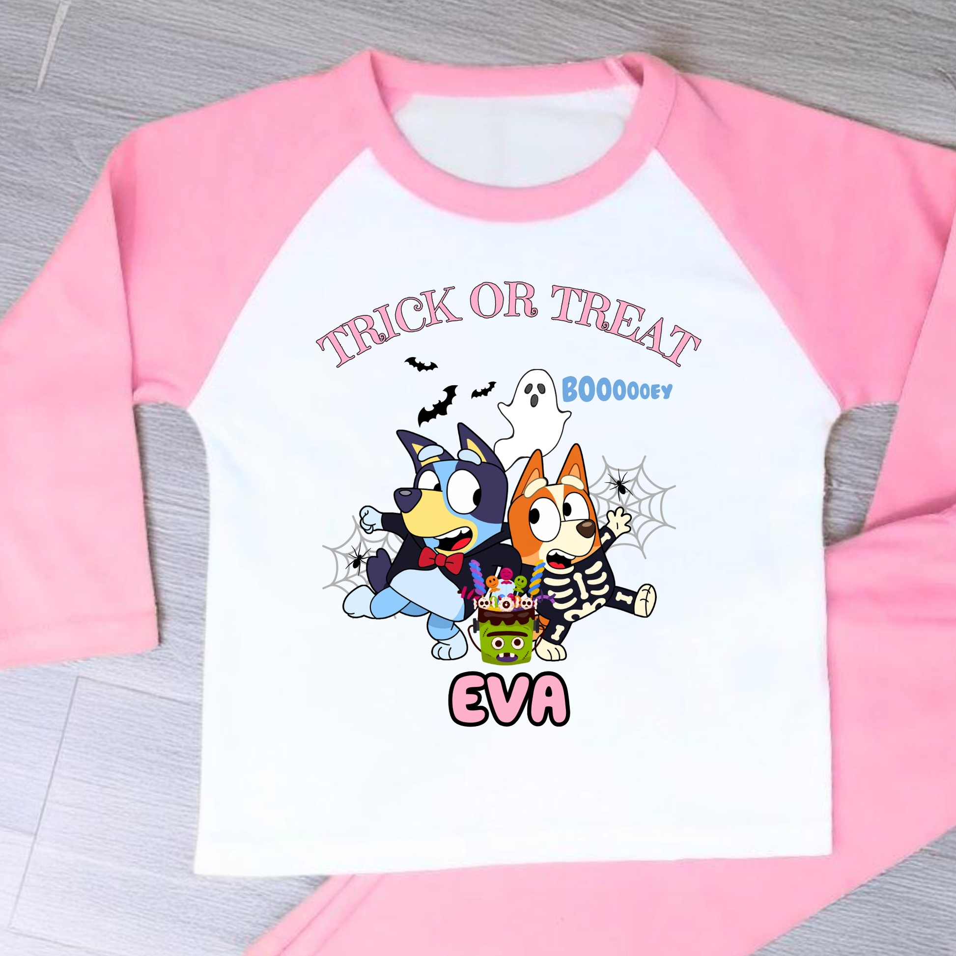 Girls personalised Bluey and Bingo Halloween pyjamas with name print and cute spooky design