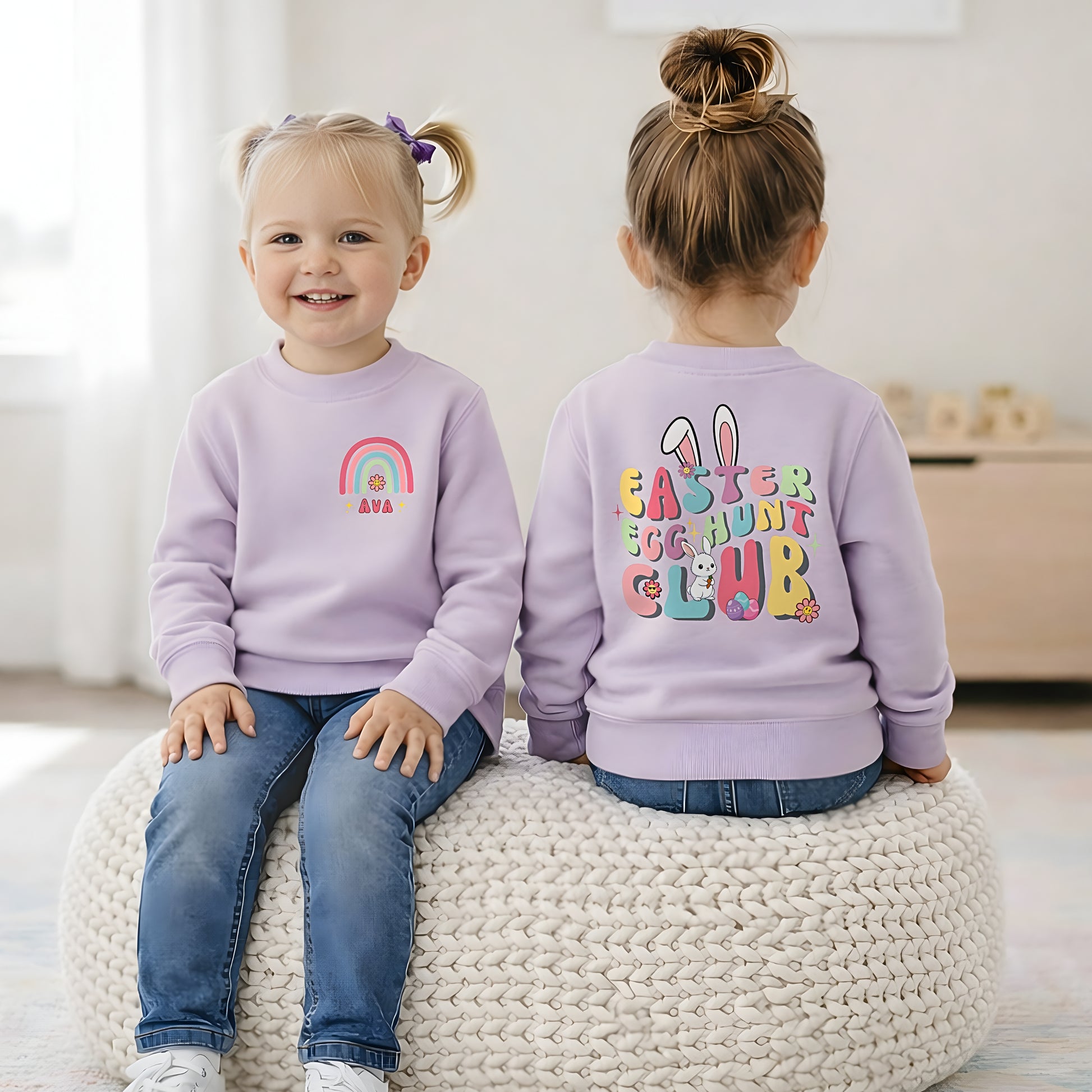 Girls personalised Easter sweatshirt with rainbow name design on front and Easter Egg Hunt Club bunny print on back