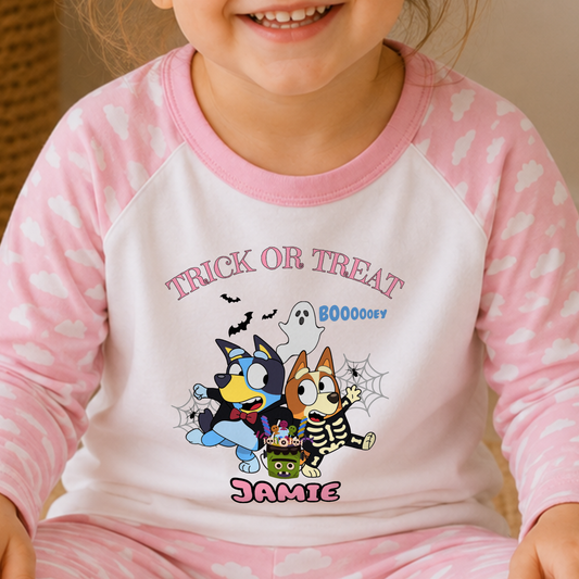 Girls personalised Bluey and Bingo Halloween pyjamas with name print and cute spooky design