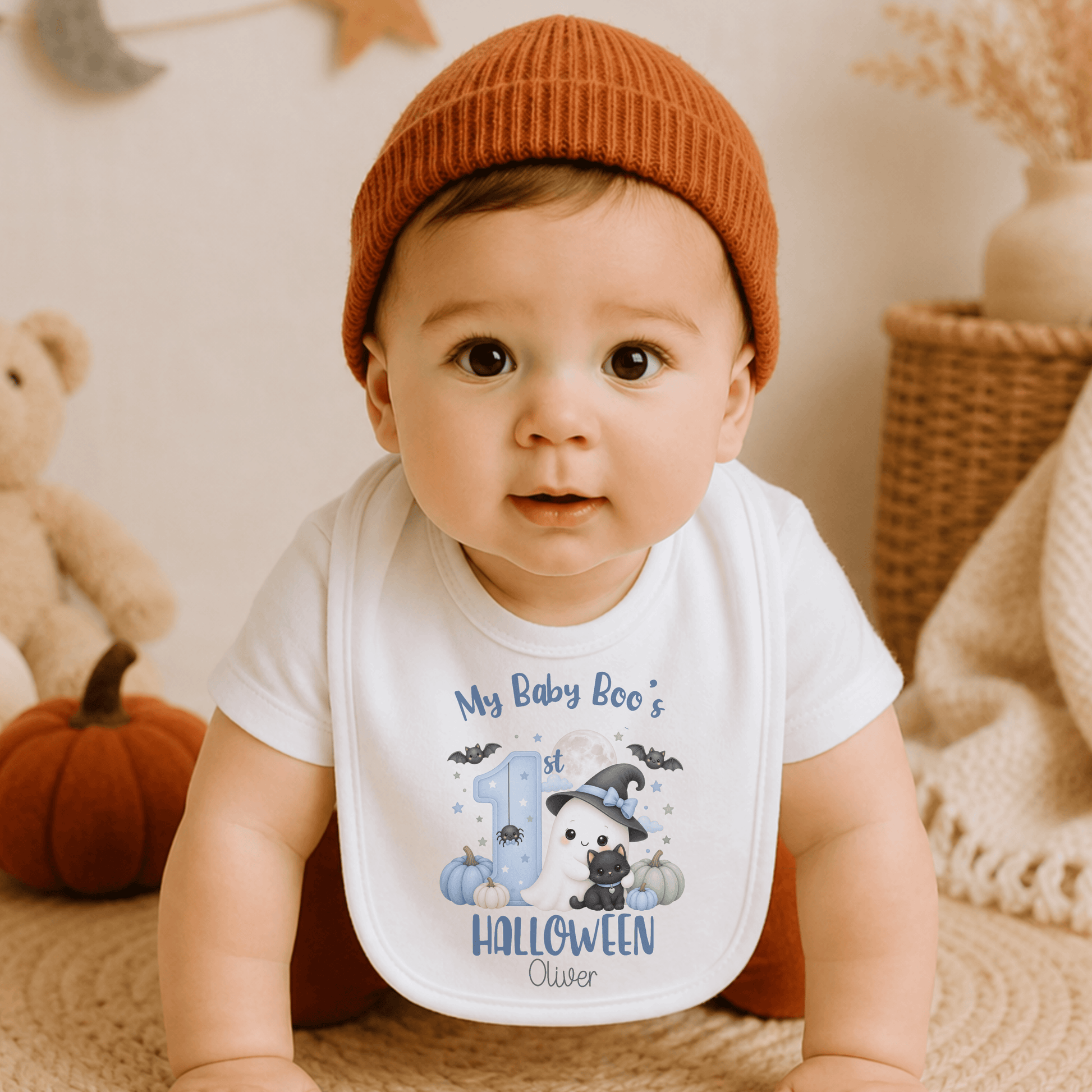 Personalised First Halloween Baby Outfit for boys featuring a cute Baby Boo ghost, black cat, pumpkins, bats and personalised 1st Halloween design.