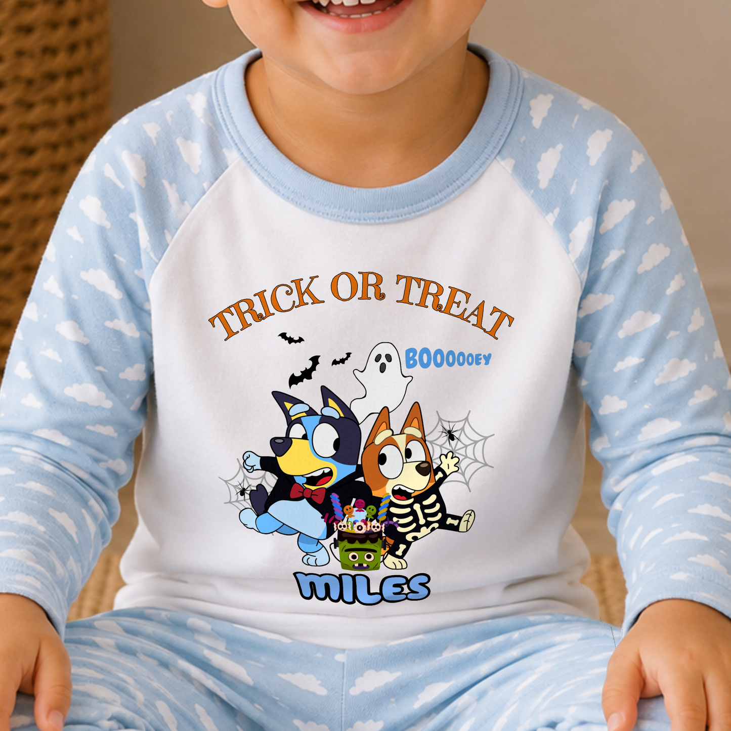 Boys personalised Bluey and Bingo Halloween pyjamas with name print and cute spooky design
