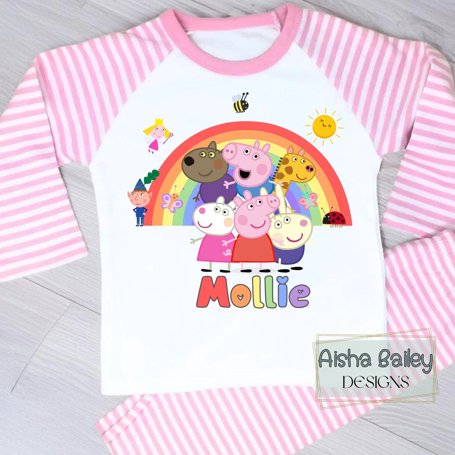 Pink Peppa Pig personalised girls pyjamas set featuring a colourful rainbow design and favourite Peppa Pig characters, customised with name and age. Made from soft, comfortable fabric with a long-sleeve top and matching cloud-print bottoms. Perfect for everyday wear, cosy nights, and relaxed mornings—ideal personalised Peppa Pig sleepwear for toddlers and young children.
